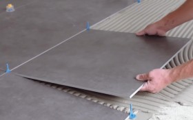 Ensemble de cales et croisillons auto nivelant pour carrelage